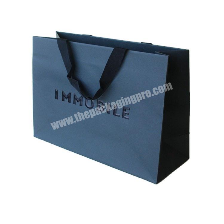 handmade luxury texture embossed black paper shopping bag with grosgrain ribbon handle