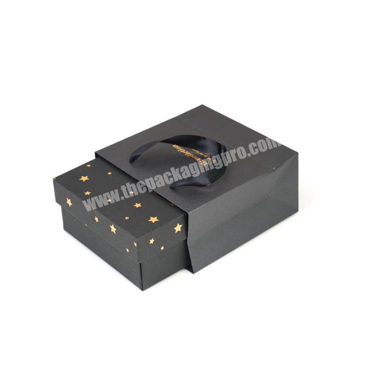 HIgh End Custom Gold Hot Foil Logo Die Cut Handle Black Paper Gift Bag With Ribbon Bow