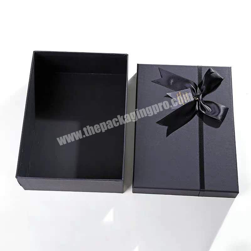 High quality clothing presents in black cardboard boxes