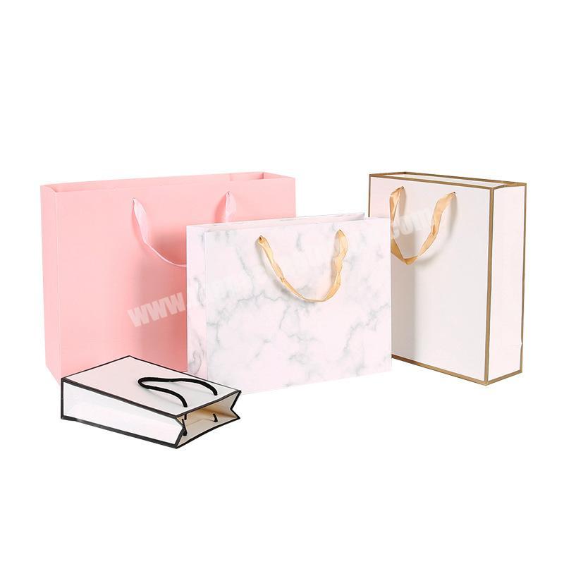 Hot sale christmas gift bags paper bag white cardboard portable custom clothing shopping bag with handle