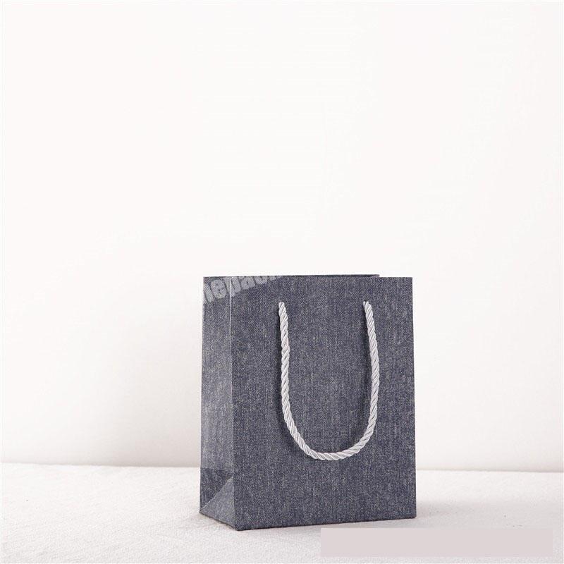 Hot Sale High Quality Recycle Pure Portable Kraft Paper Gift Packaging bag with Customized Logo