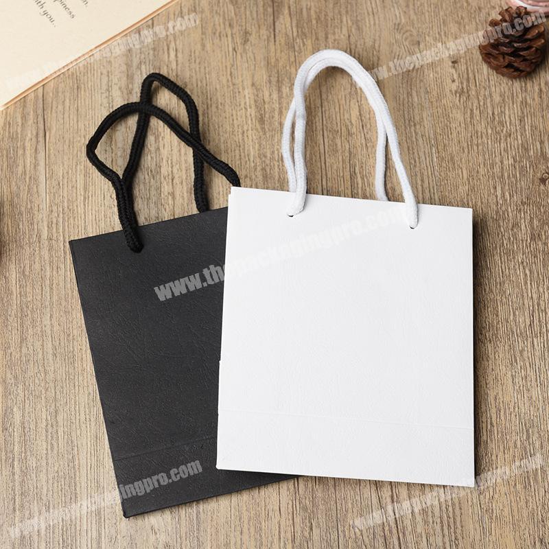 Hot selling cheap cosmetics paper bag ornament gift clothing packing foldable shopping hand bag