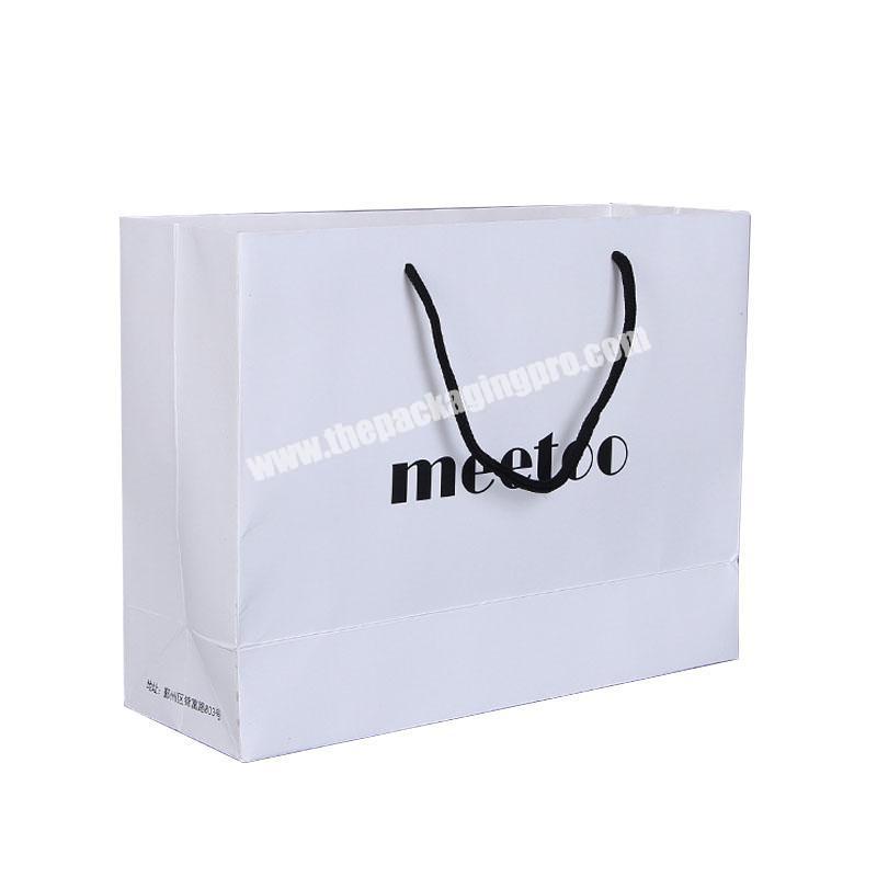 L30xW10xH20cm Custom black logo white apparel packaging paper bags with pp rope handle