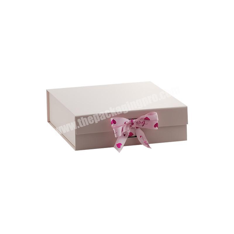 Low MOQ medium pink folding magnetic snap shut lid gift box with ribbon