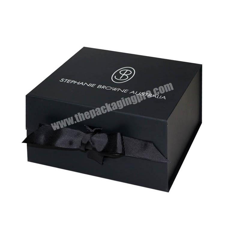 Luxury black rigid folding gift box with black ribbon