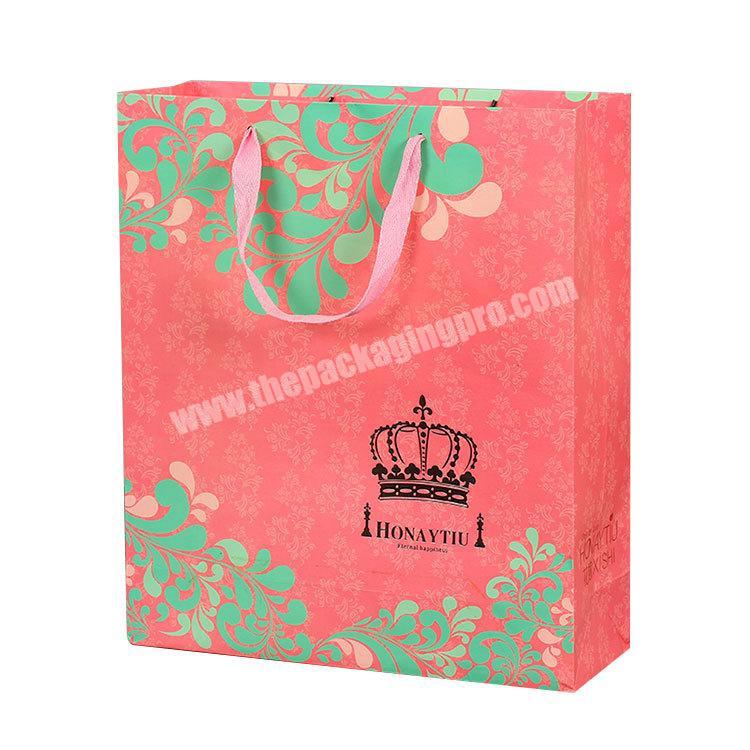Luxury design custom shopping paper bags with handles and logo