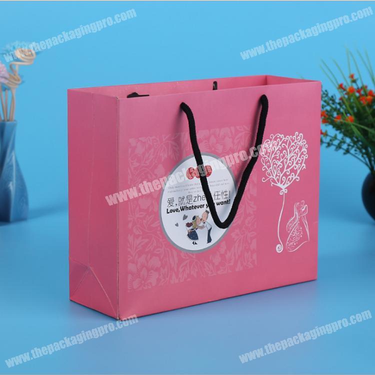 Luxury design pink coated paper customize offset print shopping paper bag murah with rope handle