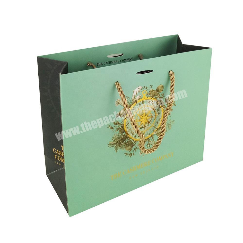 Luxury paper shopping bag with rope handle for boutique shop