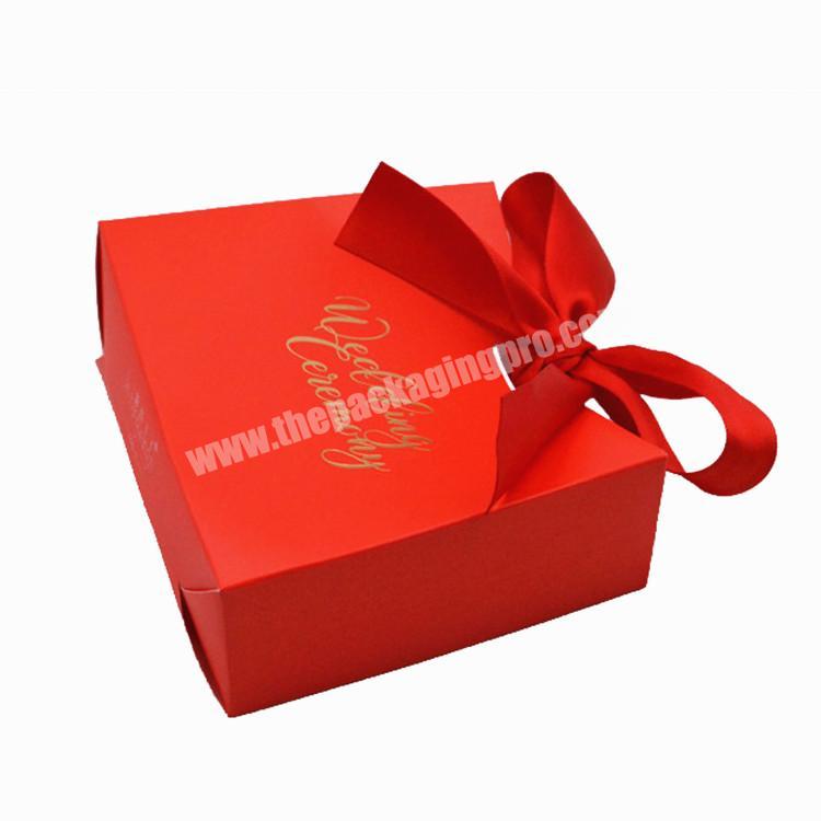 Luxury printing fashionable craft paper OEM reusable stand up grocery packaging shopping paper wedding  gift red bag with ribbon