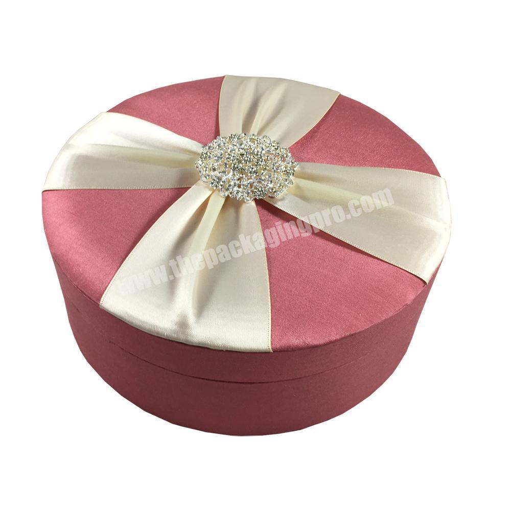 Luxury round gift box with cloth surface and ribbon cylinder packaging