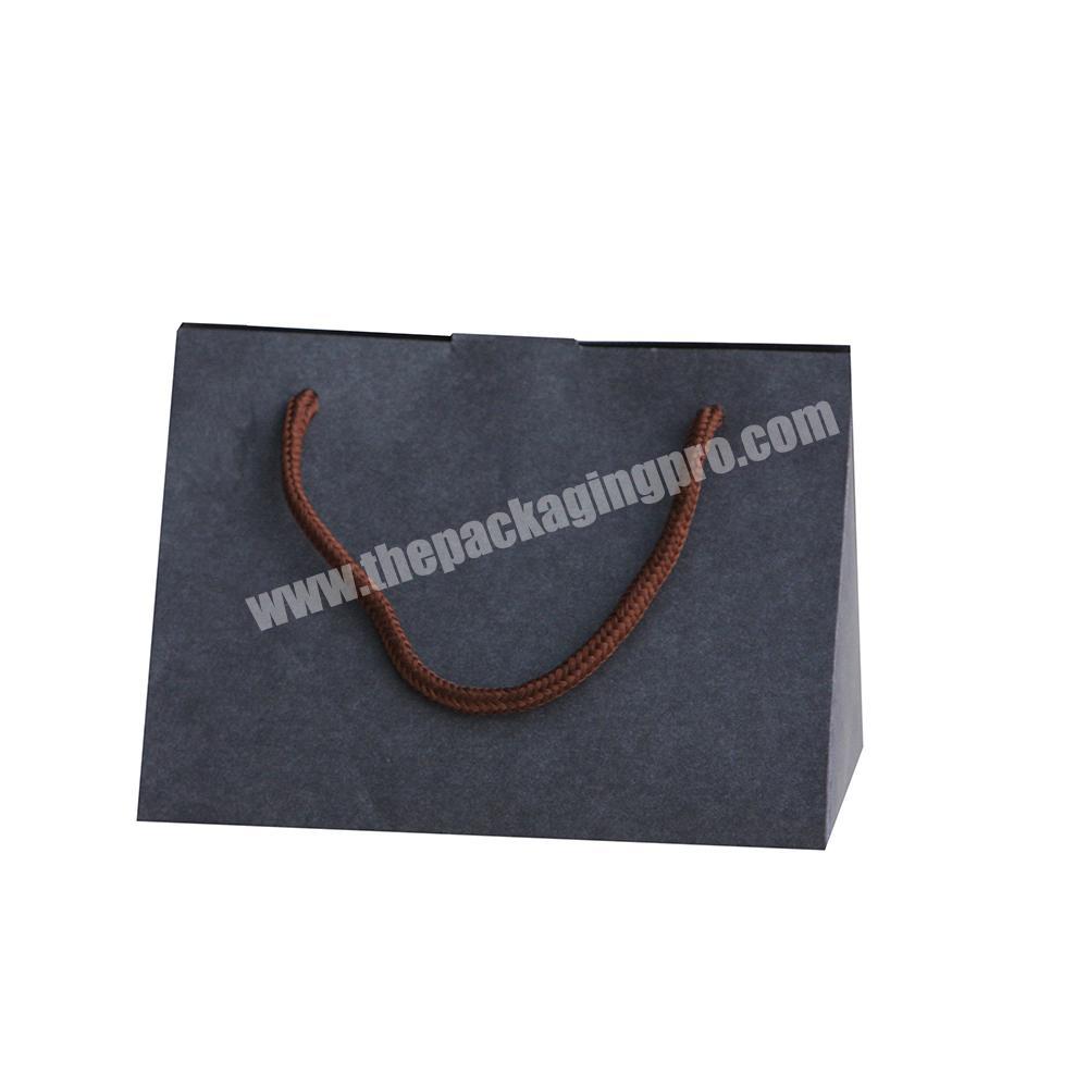 Luxury shopping paper bag for clothing packaging