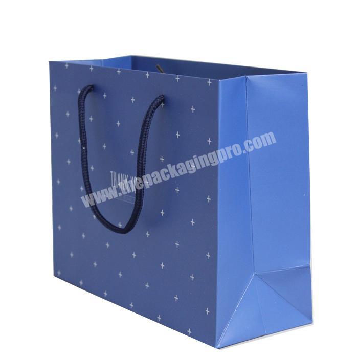 Manufacturers sell in bulk Wholesale customization Logo Printed retail paper shopping bag with handle