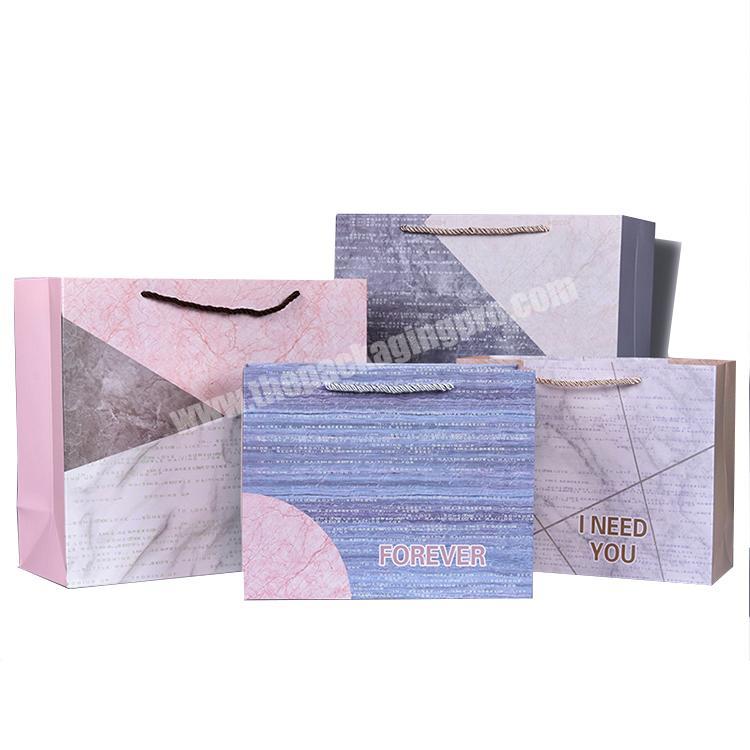 Matte laminated marble costume paper bag  for wedding gift  perfume  with handle