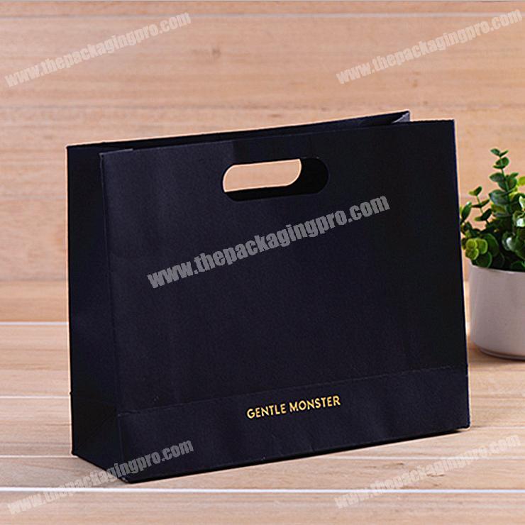 Most popular custom design gold foil logo black shopping paper shoes carry bag for famous band