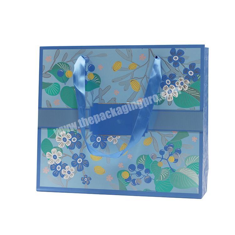 New Arrival Light Blue Paper Bag Flower Pattern Printing Custom Shopping Paper Bag