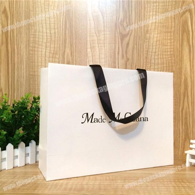 New custom printed clothing shopping gift paper bag wholesale bronzing LOGO design
