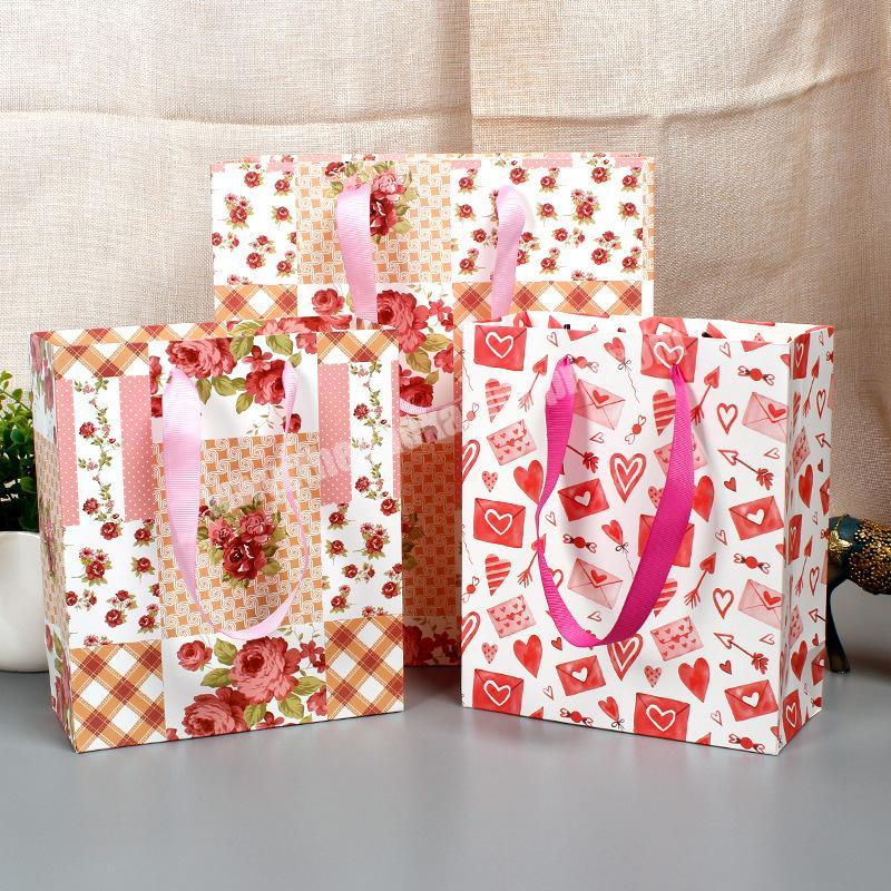 New style Custom Printed Rose gift paper bags with ribbon handles for valentine