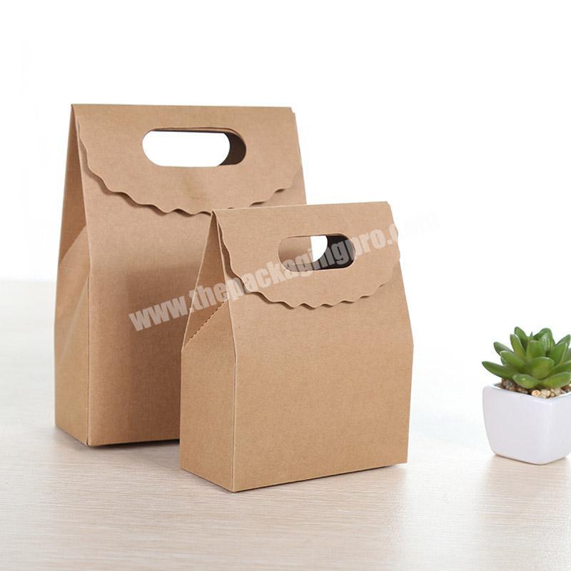Packaging boxes manufacturer Creative customized kraft paper bag handle paper carrier bag with magic sticker