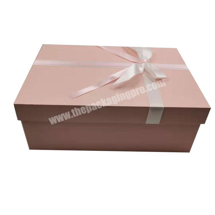 Pink art paper cardboard with ribbon wine gift box