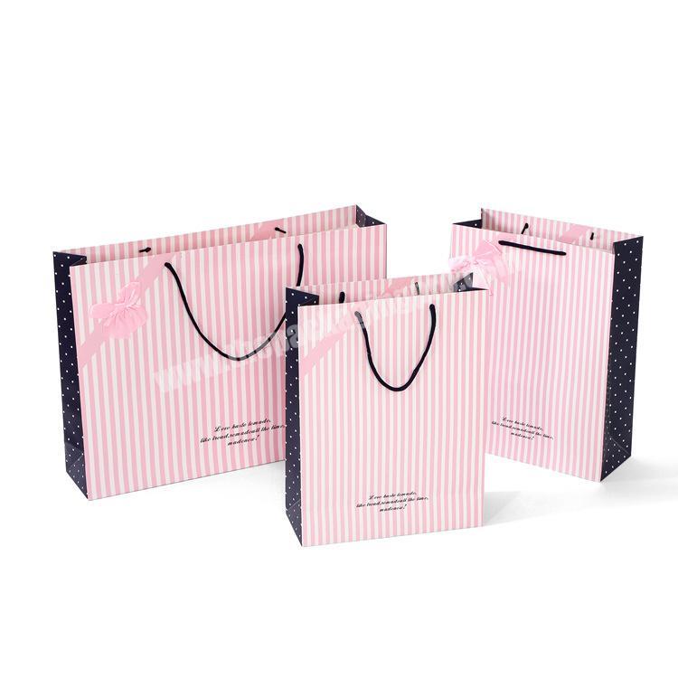 pink  carry handle bags with strips black dot in side for gift shopping packaging bags