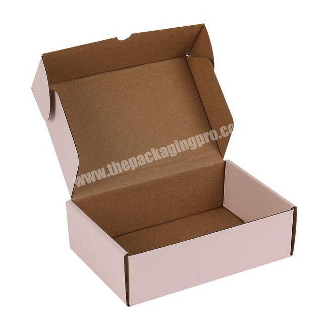 pink corrugated folding cardboard paper shipping boxes