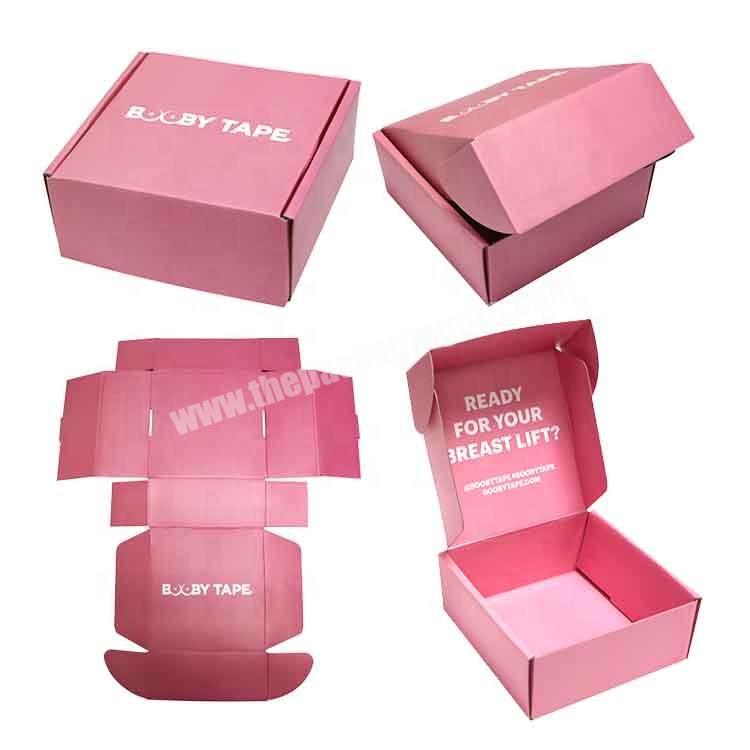 Pink packing items shipping corrugated cardboard mailer box