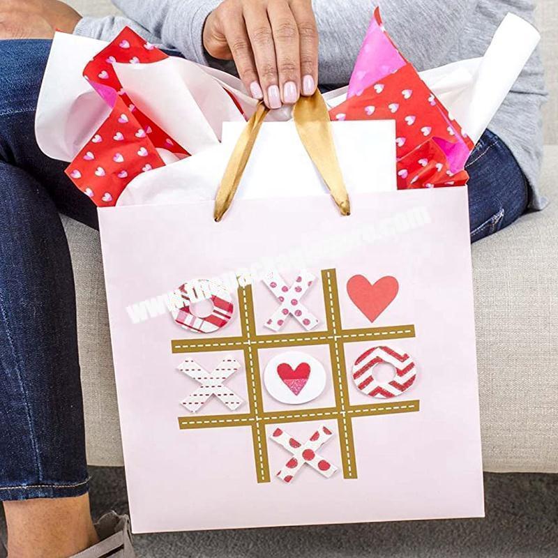 Plaid gifting paper bags with gift tag
