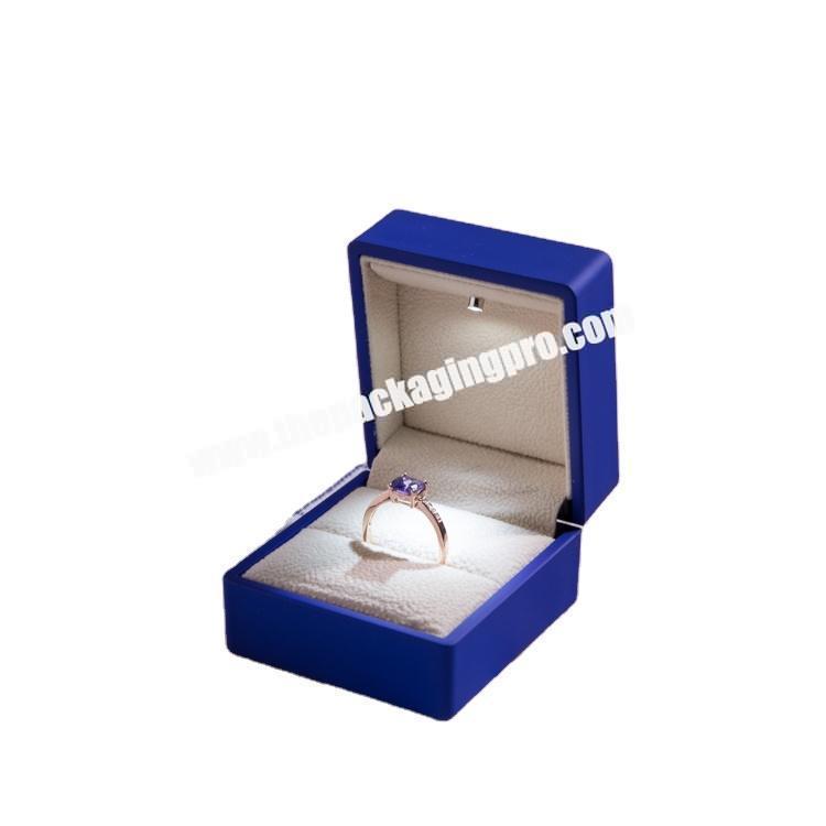 Plastic  Pure Blue color Jewelry ring Box with rubber painting and LED light ring box size 6 x 6.5 x 4.9cm