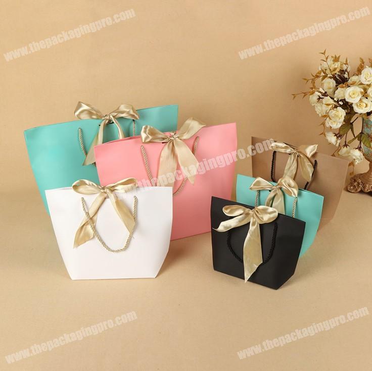 Portable printed custom made bowknot shopping paper bags