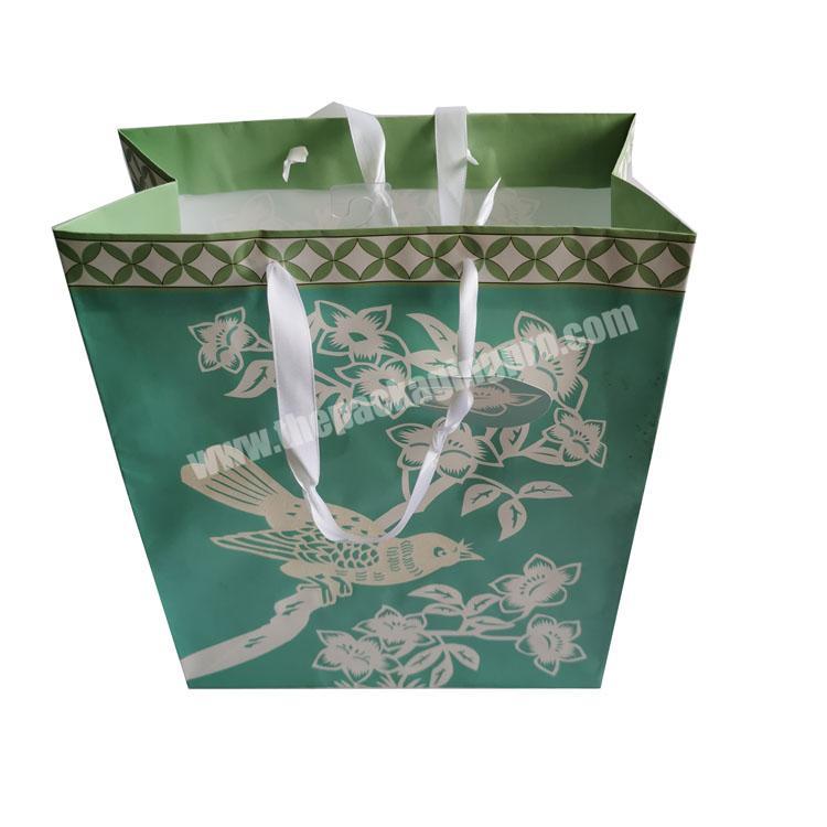 Recyclable C1S printed clothing packaging bag with rope handle