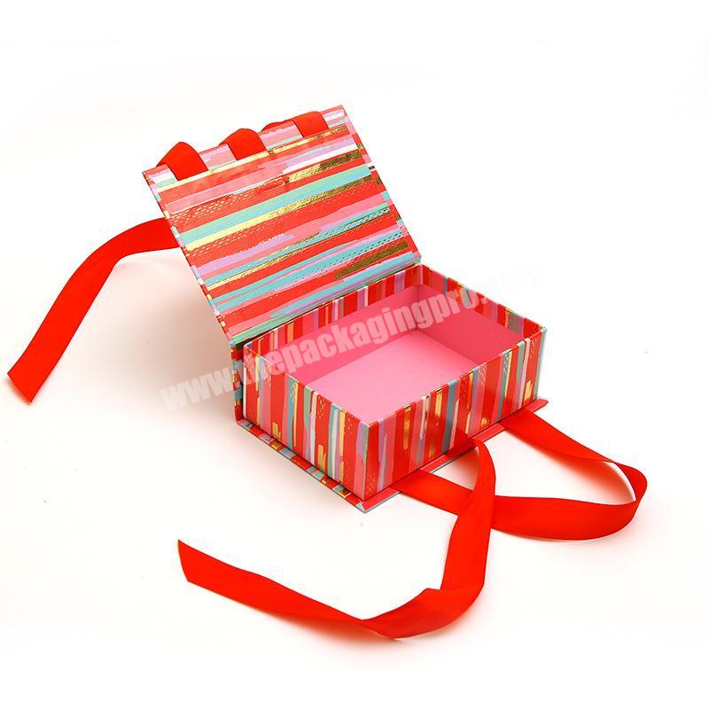 red packaging box with strip carry handle for beauty packaging