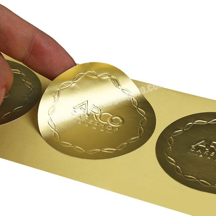 Round matte gold foil paper embossed logo commercial sticker