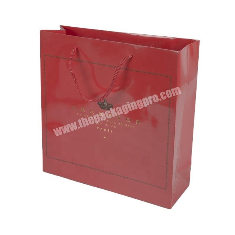 SC Luxury custom embossed logo red paper packaging bag printing
