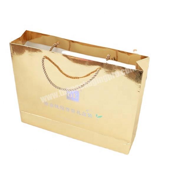 SC Top Quality Custom Made Shiny Golden Cardboard Paper Gift Packaging Bag