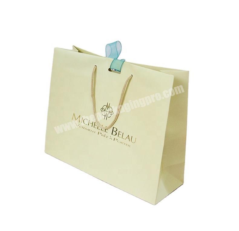 SC Wholesale customized packaging paper shopping gift bag with logo stamping