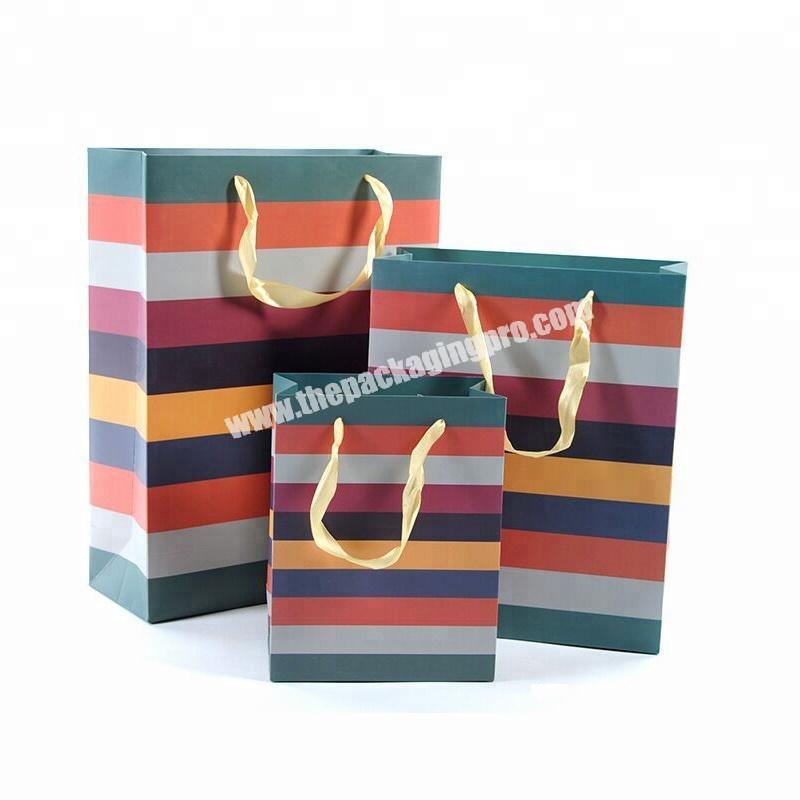 Special stripe pattern printing paper bag with ribbon handles