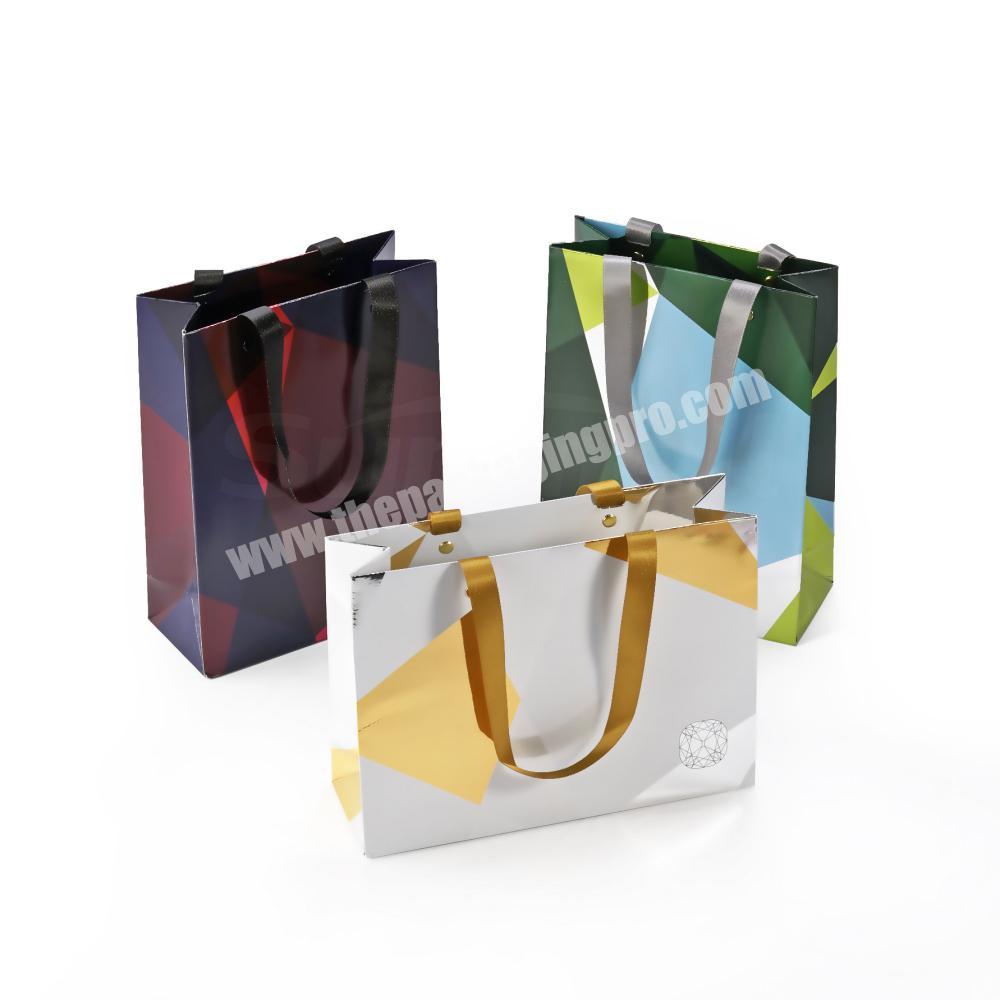 Sumptuous shiny finish paper bags with your own logo for paper gift box