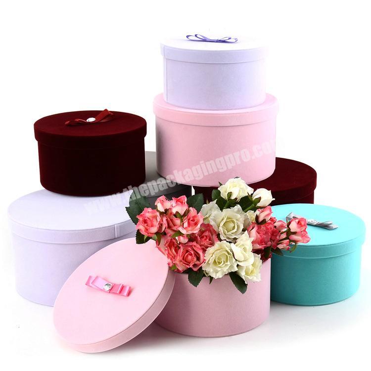The manufacturer provides customized round luxury gift boxes for flower gift packaging