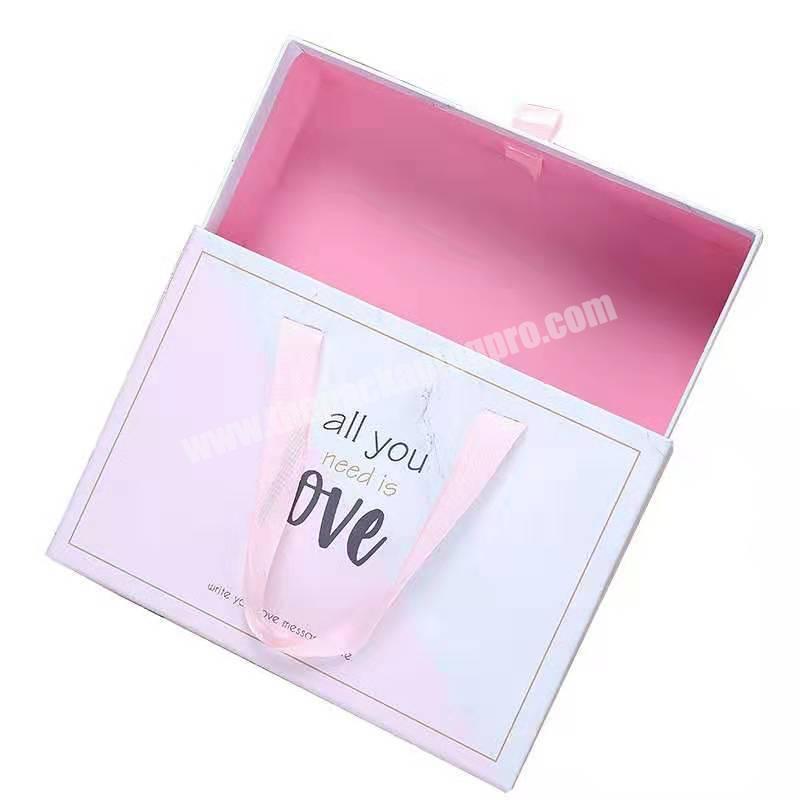 Top quality paper packaging boxes for luxury packaging with handles for clothing gifts
