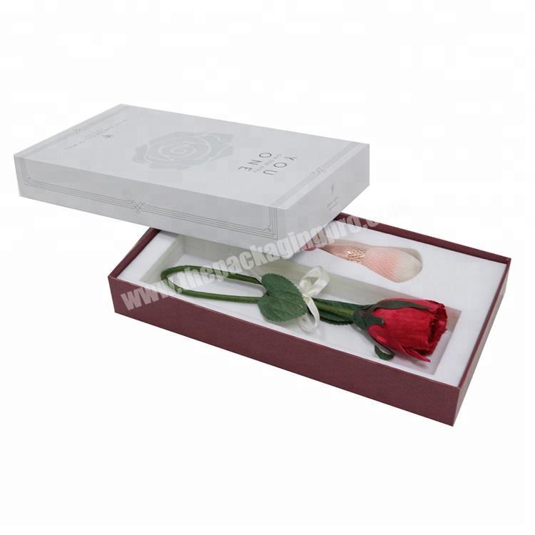White cardboard cosmetic makeup brush packaging flower box with ribbon bow