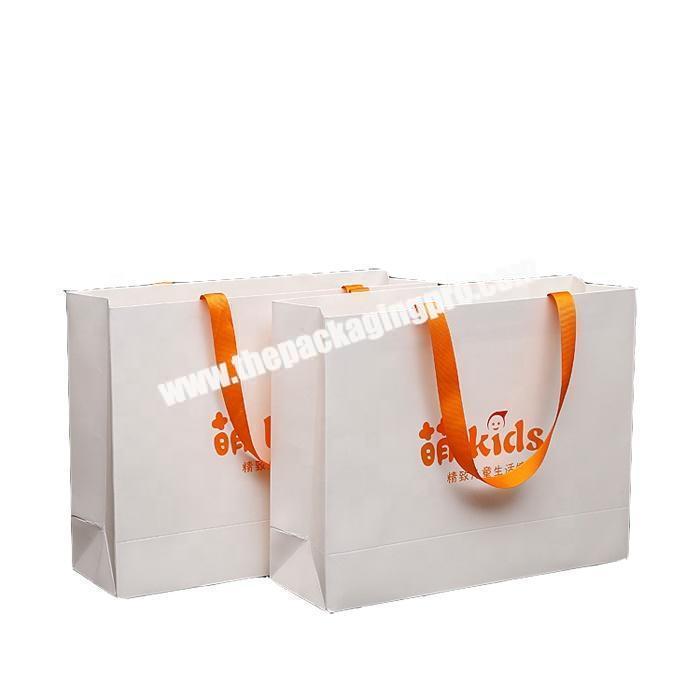 White color laminated paper shopping bag for lovely gift packaging