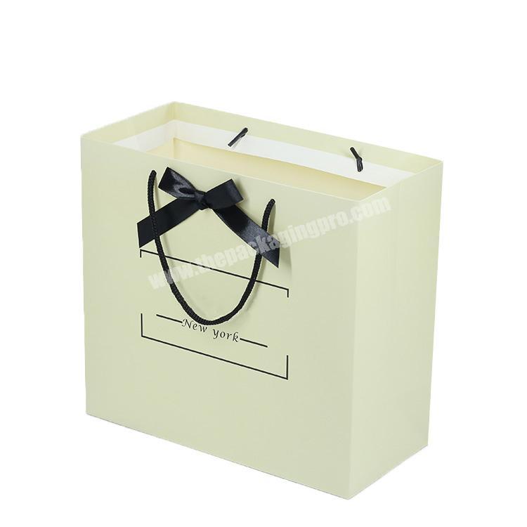White Fancy Paper Packaging Jewelry Custom Gold Foil Logo Gift Paper Bag With Fabric Handle