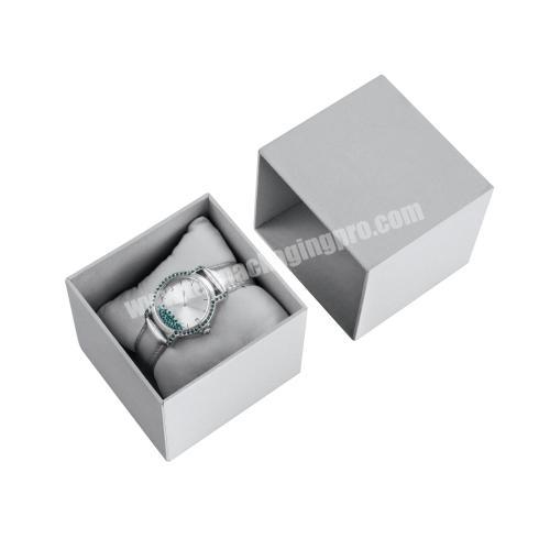white gift box with paper sleeve