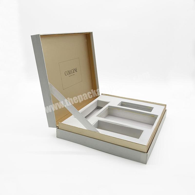 white paper packaging box with sponge tray inside