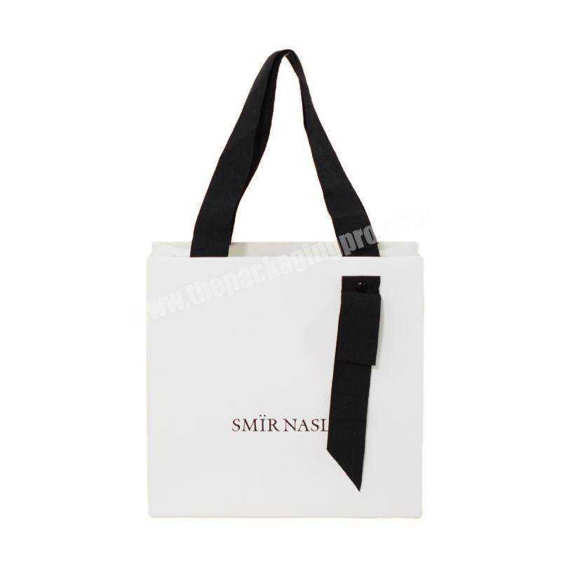 white paperbags with handles white card paper shoppers bag