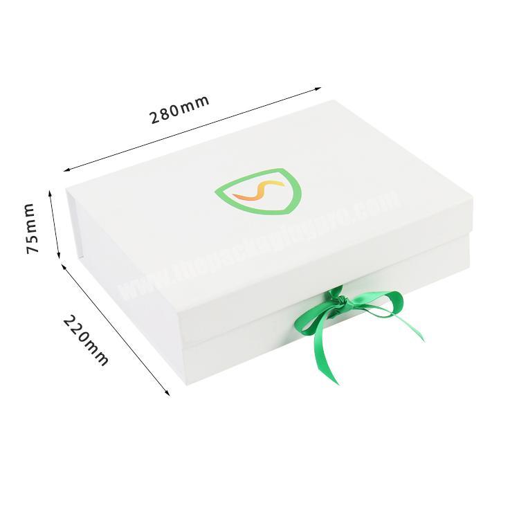 white ribbon closure folding baby gift box clothes