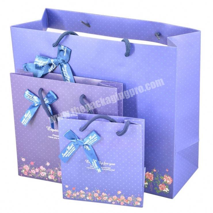 Wholesale custom print luxury gift shopping paper bag with good prices