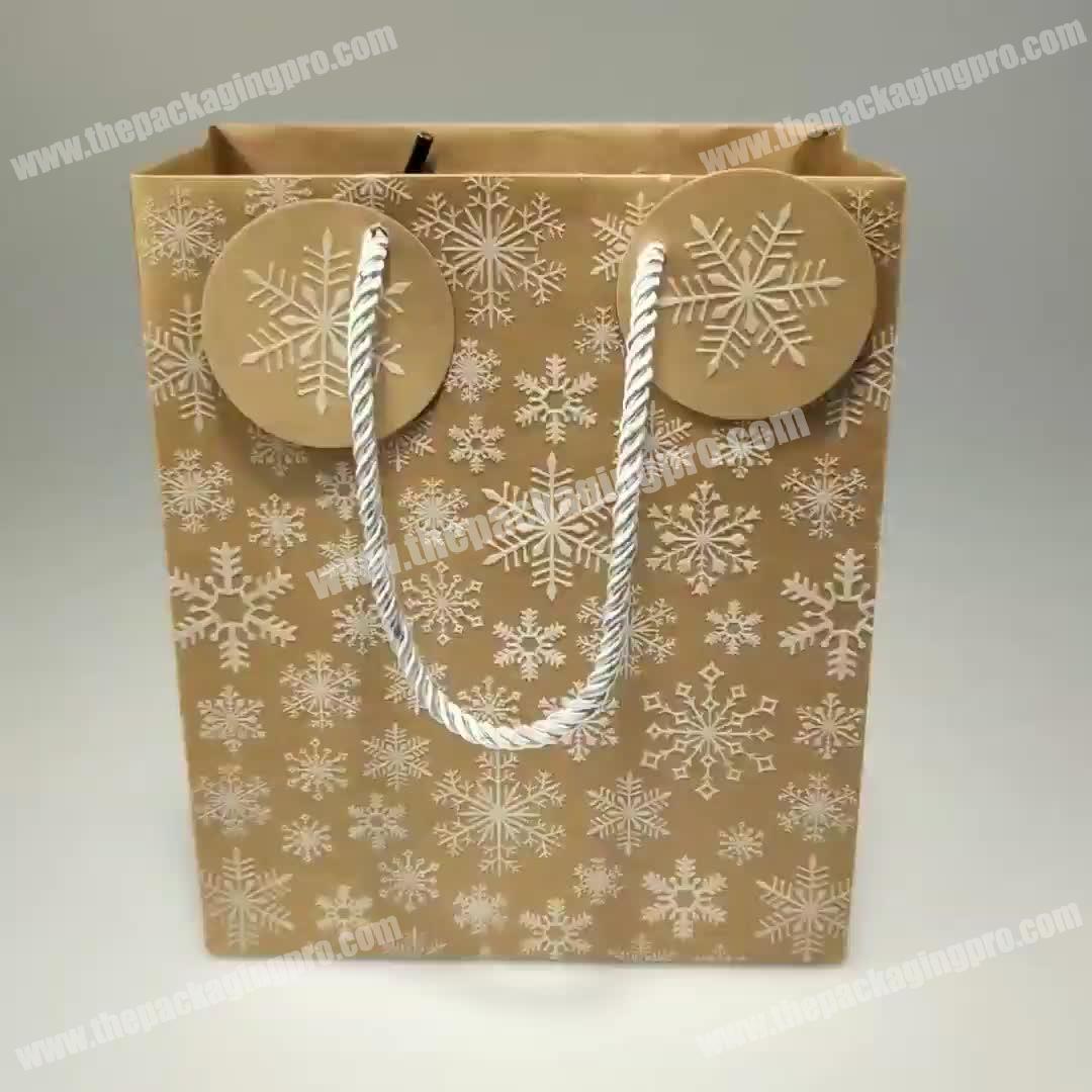 wholesale flocking snowflake brown kraft paper christmas gift bag with PP handle