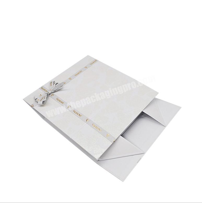 Wholesale foldable magnetic closure rigid cardboard clamshell packaging boxes for women's dress handbag