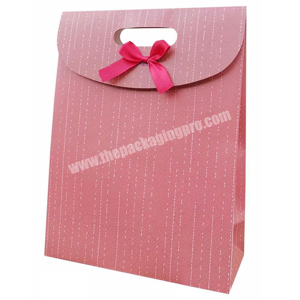 Wholesale high end luxury cardboard paper gift packaging bag with ribbon